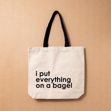 Load image into Gallery viewer, Canvas Tote by JENOA &amp; Nutmeg Creative - i put everything on a bagel

