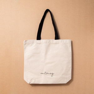 Canvas Tote by Nutmeg Creative - it's likely there's wine in here